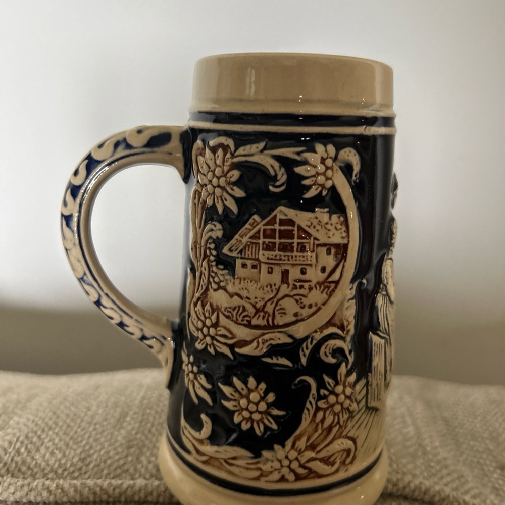 Vintage German beer stein by Marzi & Remy has a crack on bottom blue and cream
